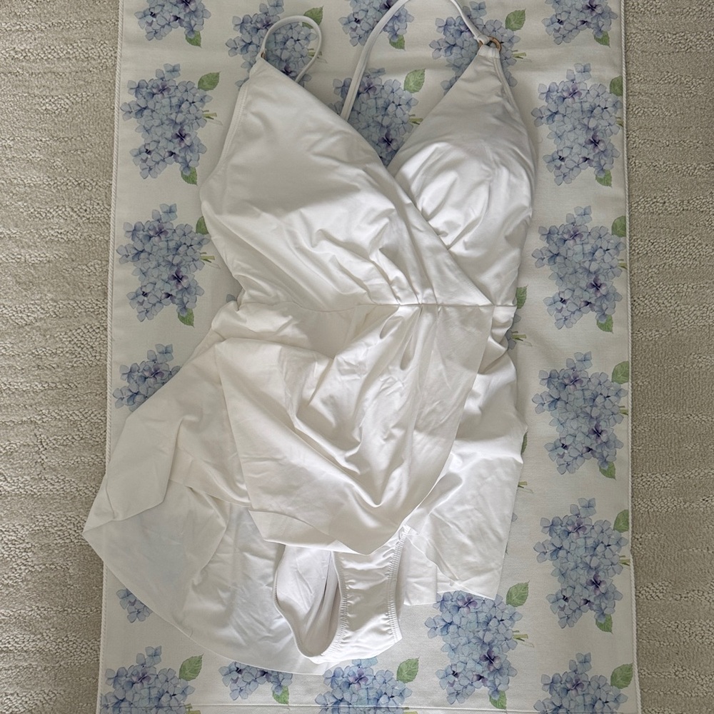 Ivory White one-piece bathing suit ready to go South for the winter.